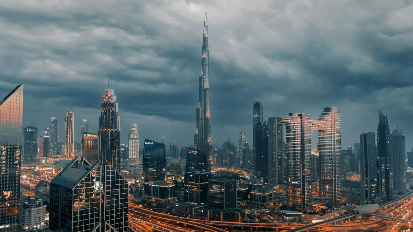 Burj Khalifa above Downtown Dubai under storm clouds