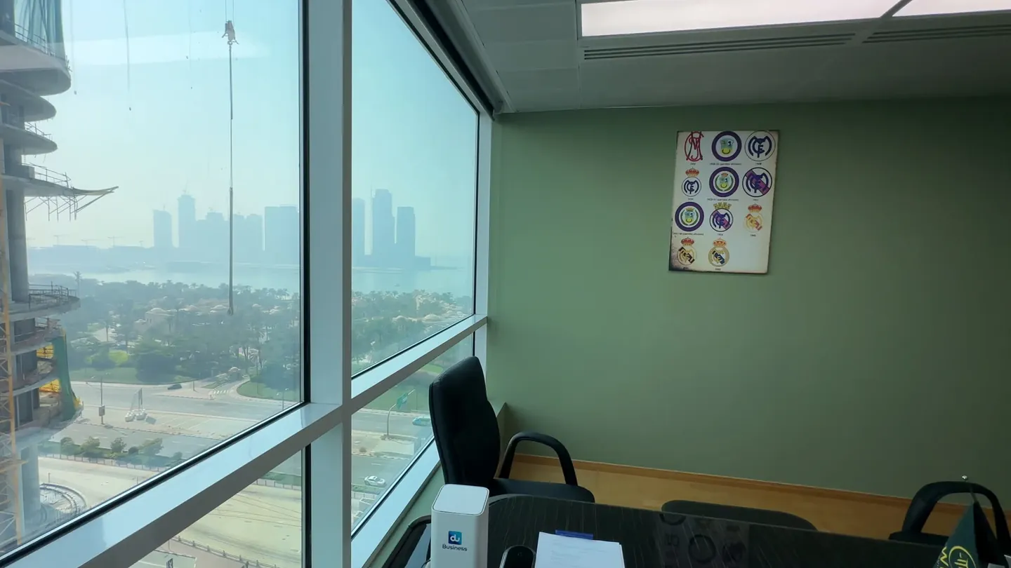 View from the office window: Dubai Media City and the hazy coastline
