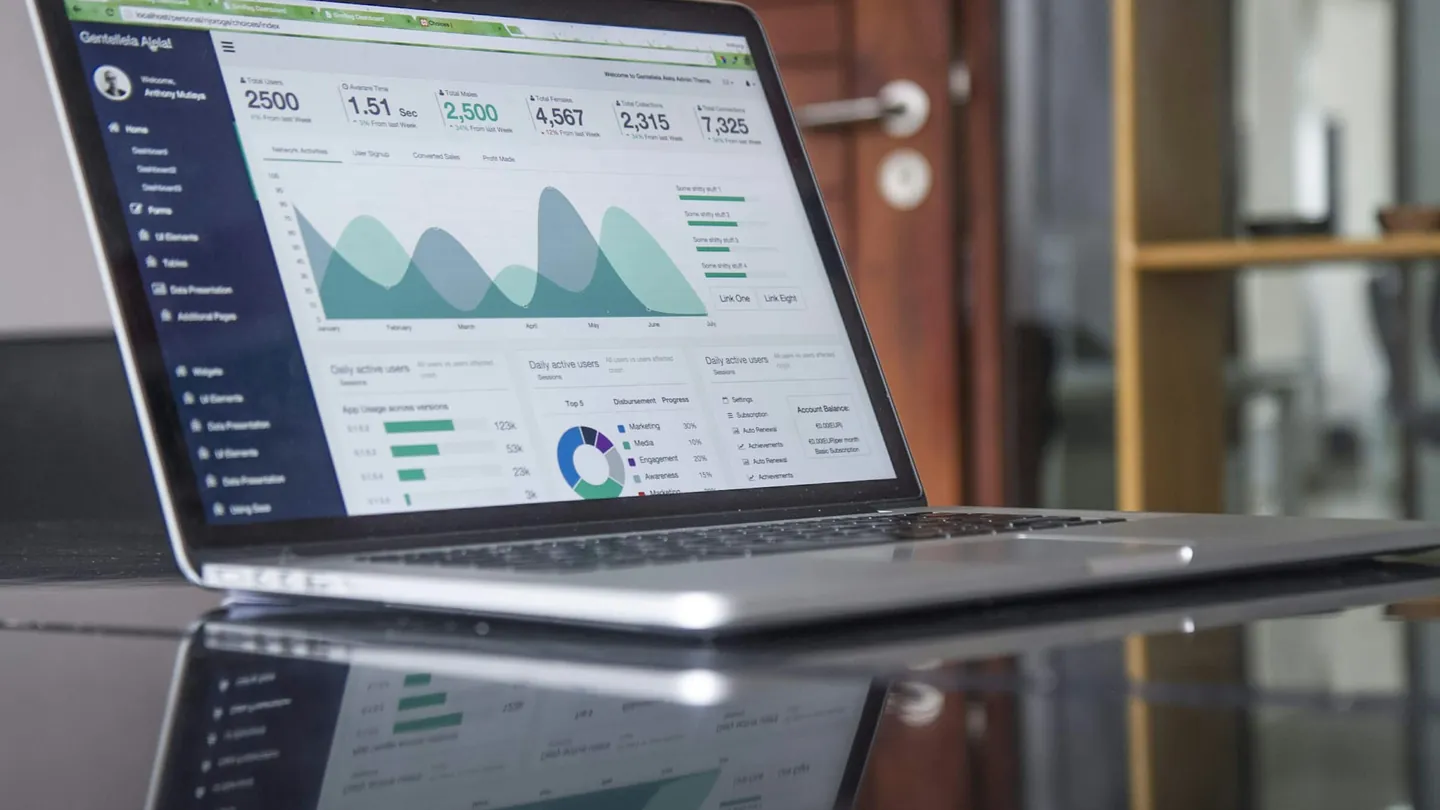 Laptop showing a financial dashboard