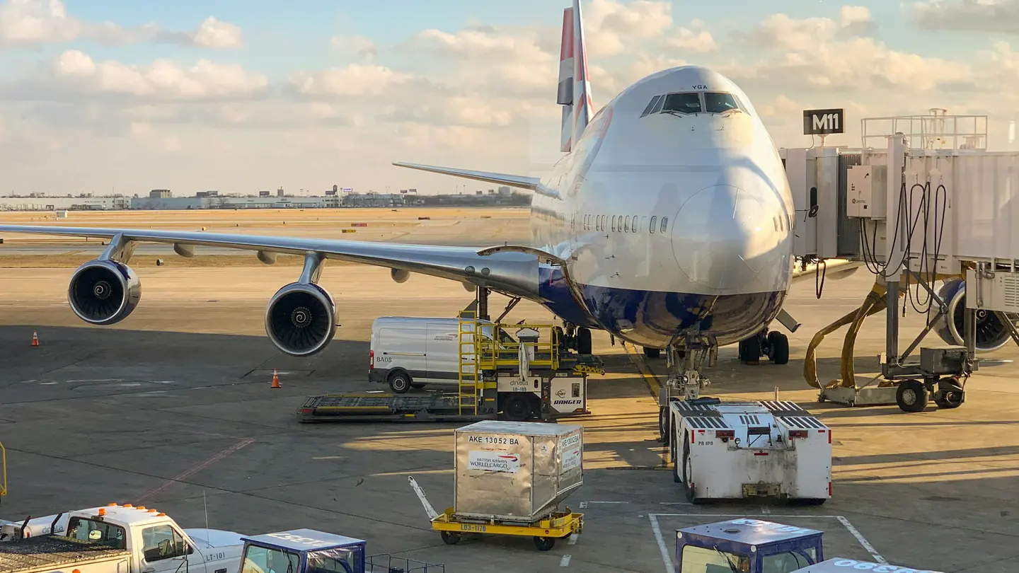 Cargo aircraft being loaded at an airport