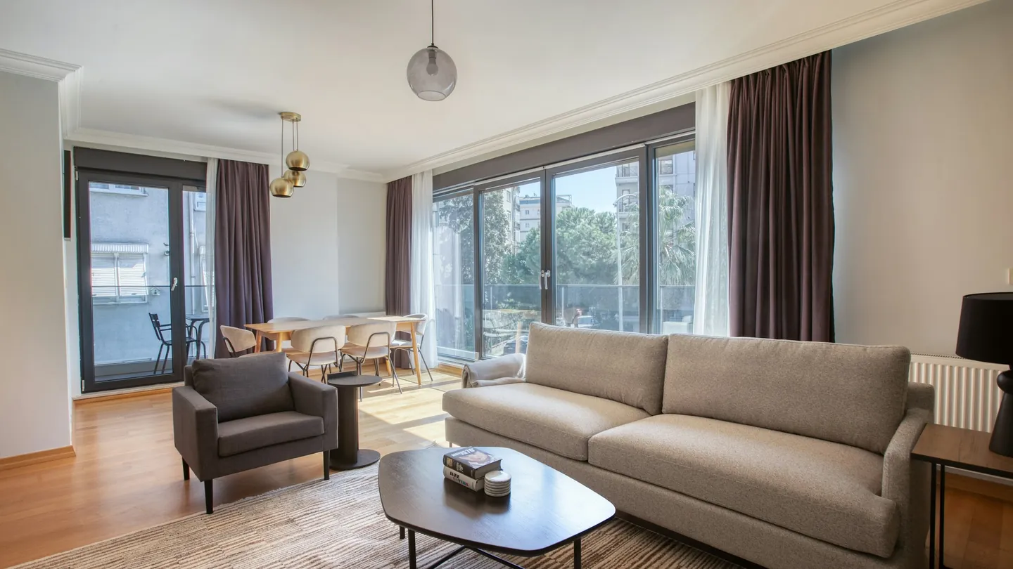 Bright living room with floor-to-ceiling windows